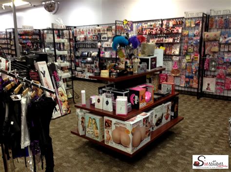 SINSATIONS ADULT BOUTIQUE .